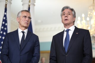 FILE - Secretary of State Antony Blinken, right, speaks with NATO Secretary General Jens Stoltenberg during a meeting, July 9, 2024, at the State Department in Washington. (AP Photo/Stephanie Scarbrough, file)