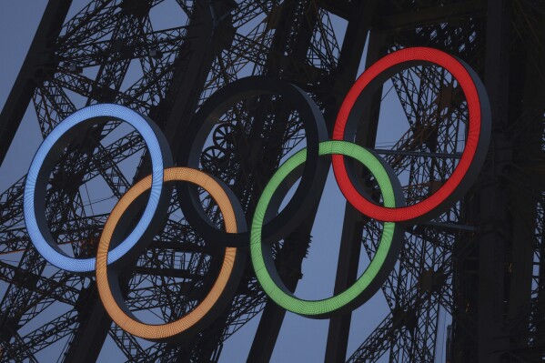 FILE - A general view of the Olympic rings displayed on the Eiffel Tower is pictured during the opening ceremony for the 2024 Summer Olympic Games. (Nir Elias/Pool Photo via AP, File)