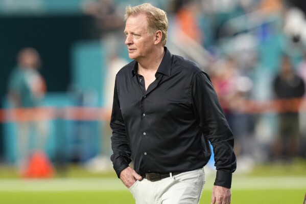 FILE - NFL Commissioner Roger Goodell walks on the field before an NFL football game between the Miami Dolphins and the Buffalo Bills, Sept. 12, 2024, in Miami Gardens, Fla. (AP Photo/Lynne Sladky, File)