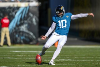 FILE - Jacksonville Jaguars kicker Brandon McManus (10) kicks off the ball during an NFL football game against the Carolina Panthers, Sunday, Dec. 31, 2023, in Jacksonville, Fla. (AP Photo/Doug Murray, File)