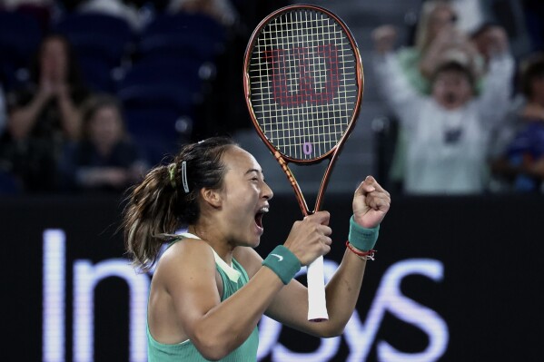 Zheng Qinwen of China celebrates after defeating Dayana Yastremska of Ukraine in semifinal match at the Australian Open tennis championships at Melbourne Park, Melbourne, Australia, Thursday, Jan. 25, 2024. (AP Photo/Asanka Brendon Ratnayake)