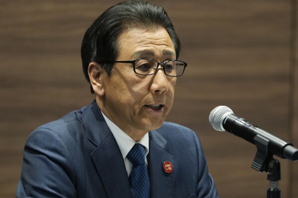 Sapporo Mayor Katsuhiro Akimoto speaks during a news conference in Tokyo, Wednesday, Oct. 11, 2023. Sapporo and Japanese Olympic Committee on Wednesday officially announced a decision to withdraw the northern Japanese city as a candidate to host the 2030 Winter Olympics, its bid soiled by massive corruption and bid-rigging tied to the one-year delayed 2020 Tokyo Games. (AP Photo/Hiro Komae)