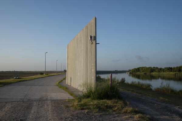 A private border wall that extends nearly three miles stands in Mission, Texas, on Friday morning, Aug. 9, 2024. (Verónica Gabriela Cárdenas/The Texas Tribune via AP)