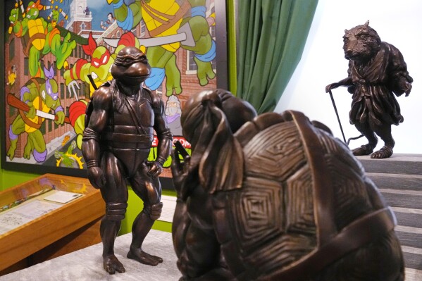 ronze statues of the Teenage Mutant Ninja Turtles characters are displayed as part of the permanent collection at the Woodman Museum, Thursday, Sept. 5, 2024, in Dover, N.H. (AP Photo/Charles Krupa)