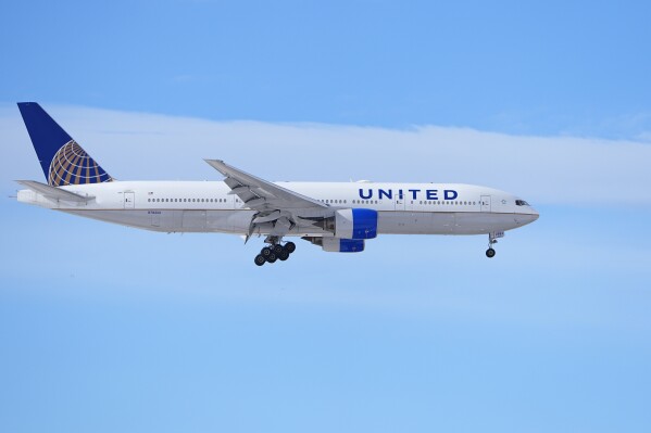 FILE - A United Airlines jetliner glides in for a landing at Denver International Airport on Jan. 16, 2024, in Denver. (AP Photo/David Zalubowski, File)