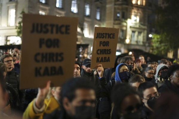 People demonstrate outside the Old Bailey in central London, Monday Oct. 21, 2024, after the London police officer who fatally shot Chris Kaba was acquitted of murder. (Jordan Pettitt/PA via AP)