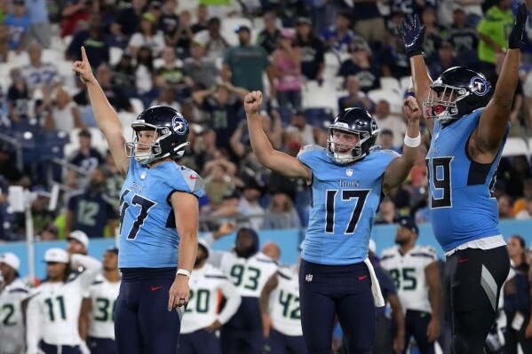 Tennessee Titans kicker Brayden Narveson (47) celebrates with teammates after kicking a 46-yard field goal at the end of an NFL preseason football game against the Seattle Seahawks, Saturday, Aug. 17, 2024, in Nashville, Tenn. The Titans won 16-15. (AP Photo/George Walker IV)