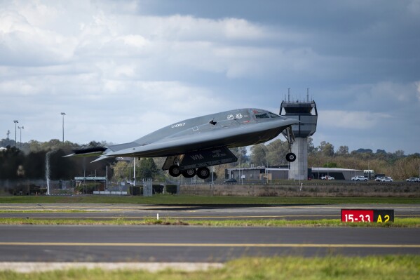 In this photo released by U.S. Air National Guard, a U.S. Air Force B-2 Spirit stealth bomber takes off from a Royal Australian Air Force base in Amberley, Australia, Sept. 11, 2024. U.S. long-range B-2 stealth bombers launched airstrikes early Thursday, Oct. 17, 2024, targeting underground bunkers used by Yemen's Houthi rebels, officials said. (Staff Sgt. Whitney Erhart/U.S. Air National Guard via AP)