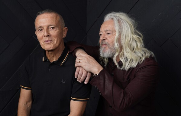 FILE - Curt Smith, left, and Roland Orzabal, of the band Tears For Fears, pose for a portrait in Los Angeles on Jan. 19, 2022. (AP Photo/Chris Pizzello, File)