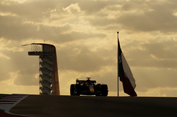 Red Bull driver Max Verstappen, of the Netherlands, tops a hill during a qualifying session for the Formula One U.S. Grand Prix auto race at Circuit of the Americas, Saturday, Oct. 19, 2024, in Austin, Texas. (AP Photo/Eric Gay)