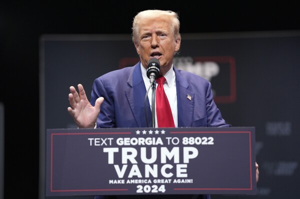 Republican presidential nominee former President Donald Trump speaks about the tax code and manufacturing at the Johnny Mercer Theatre Civic Center, Tuesday, Sept. 24, 2024, in Savannah, Ga. (AP Photo/Evan Vucci)