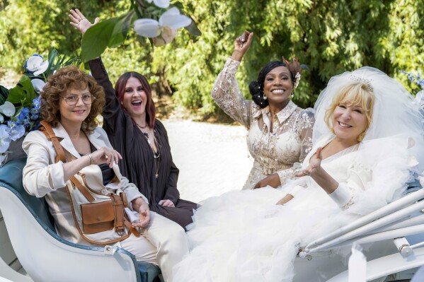 This image released by Bleecker Street shows, from left, Susan Sarandon, Megan Mullally, Sheryl Lee Ralph and Bette Midler in a scene from "The Fabulous Four." (Bleecker Street via AP)