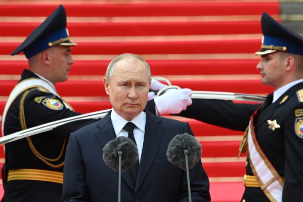 FILE - Russian President Vladimir Putin addresses members of the Defense Ministry, the National Guard, the Interior Ministry, the Federal Security Service and the Federal Guard Service at the Kremlin, in Moscow on June 27, 2023. Putin will begins his fifth term as Russian president in an opulent Kremlin inauguration on Tuesday after destroying his political opposition, launching a devastating war in Ukraine and consolidating power. (Sergei Guneyev, Sputnik, Kremlin Pool Photo via AP, File)