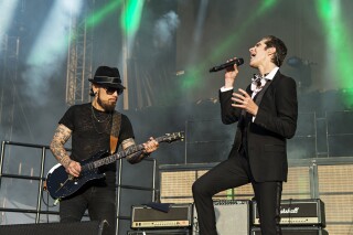 FILE - Dave Navarro, left, and Perry Farrell of Jane's Addiction peform during KAABOO 2017 at the Del Mar Racetrack and Fairgrounds on Saturday, Sept. 16, 2017, in San Diego, Calif. (Photo by Amy Harris/Invision/AP, File)