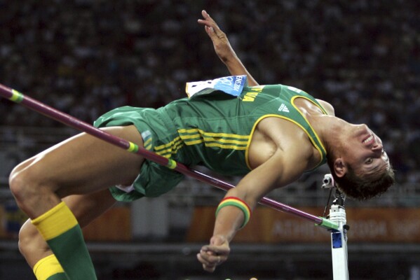 FILE - South Africa's Jacques Freitag competes in the men's high jump of the 2004 Olympic Games, in the Olympic Stadium in Athens, Friday Aug. 20, 2004. Local media is reporting that South African police have discovered the body of former high jump world champion Jacques Freitag after he went missing last month. The reports said the 42-year-old, who won the 2003 world title in Paris and competed at the 2004 Olympics, had been shot. (AP Photo/David J. Phillip, File)