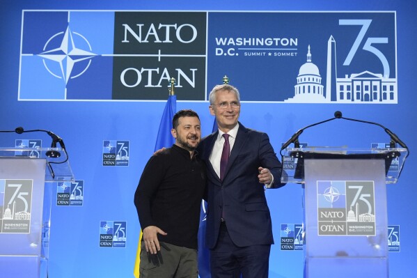 FILE - Ukraine's President Volodymyr Zelenskyy and NATO Secretary General Jens Stoltenberg wrap up a joint press conference on July 11, 2024. (AP Photo/Mark Schiefelbein, File)