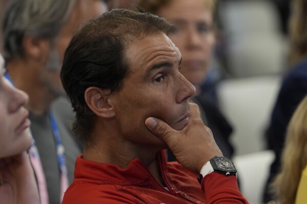 Rafael Nadal of Spain attends the tennis official draw ceremony, at the 2024 Summer Olympics, Thursday, July 25, 2024, in Paris, France. (AP Photo/Andy Wong)