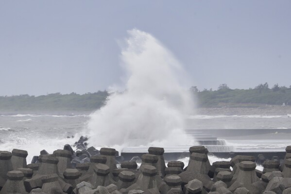 Waves crash onto the coastline as Typhoon Krathon approaches to Taiwan in Yilan County, eastern coast of Taiwan, Tuesday, Oct. 1, 2024. (AP Photo/Chiang Ying-ying)