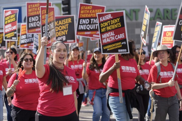 Mental health workers rally outside Kaiser Permanente Los Angeles Medical Center as they begin an open-ended strike in Los Angeles Monday, Oct. 21, 2024. (AP Photo/Damian Dovarganes)