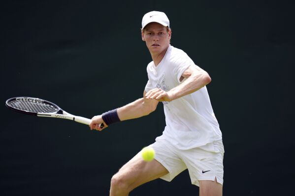 Italy's Jannik Sinner practices at the All England Lawn Tennis and Croquet Club in Wimbledon ahead of the Wimbledon Championships, scheduled to begin on July, Wednesday June 26, 2024. (John Walton/PA via AP)