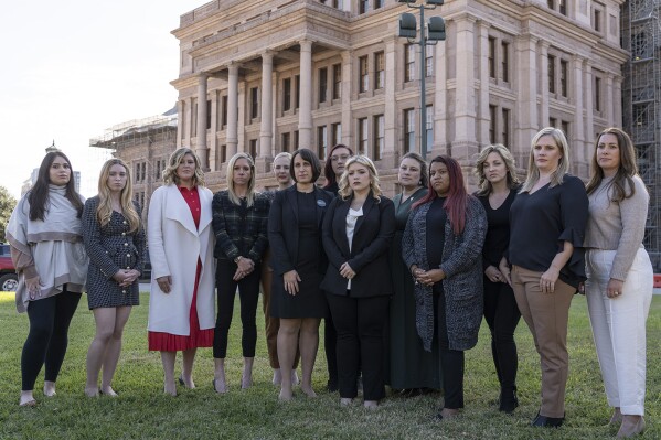 Center for Reproductive Rights attorney Molly Duane and plaintiffs stand outside the Texas Capitol in Austin, Texas, after the Texas Supreme Court heard oral arguments for Zurawski v. State of Texas, Tuesday, Nov. 28, 2023. (Mikala Compton/Austin American-Statesman via AP)