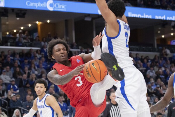 FILE - Memphis forward Nick Jourdain (2) defends against SMU guard Chuck Harris (3) during the second half of an NCAA college basketball game Sunday, Jan. 7, 2024, in Memphis, Tenn. (AP Photo/Nikki Boertman, file)