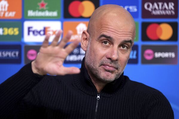 Manchester City manager Pep Guardiola attends the press conference, a day before the Champions League soccer match against Sparta Praha, at the City Football Academy in Manchester, England, Tuesday, Oct. 22, 2024. (Martin Rickett/PA via AP)