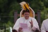 Pope Francis wears a traditional hat during a meeting with faithful in Vanimo, Papua New Guinea, Sunday, Sept. 8, 2024. . (AP Photo/Gregorio Borgia)