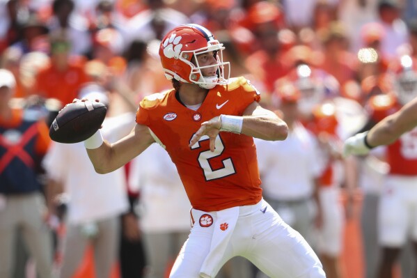 Clemson quarterback Cade Klubnik (2) throws a pass during the first half of an NCAA college football game against North Carolina State Saturday, Sept. 21, 2024, in Clemson, S.C. (AP Photo/Artie Walker Jr.)