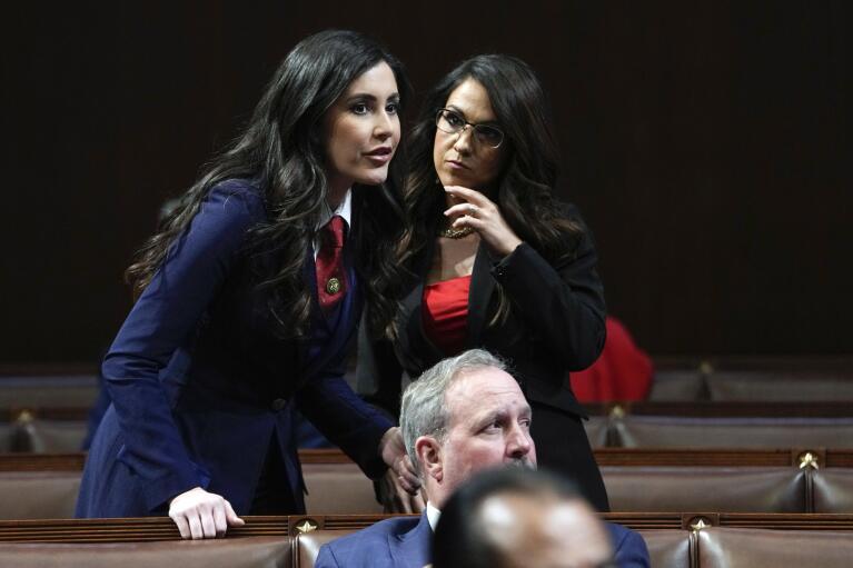 Rep. Anna Paulina Luna, R-Fla., left, talks with Rep. Lauren Boebert, R-Colo., before President Joe Biden delivers the State of the Union address to a joint session of Congress at the U.S. Capitol, Tuesday, Feb. 7, 2023, in Washington.(AP Photo/Jacquelyn Martin, Pool)