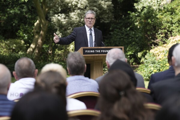 Britain's Prime Minister Keir Starmer delivers a speech and press conference in the Rose Garden at 10 Downing Street, London, Tuesday, Aug. 27, 2024. (Stefan Rousseau/Pool Photo via AP)